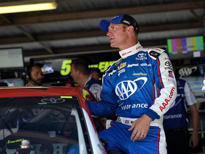 FILE - In this May 30, 2015, file photo, driver Clint Bowyer climbs into his car before during practice for the NASCAR Sprint Cup series auto race at Dover International Speedway in Dover, Del. Billy Scott is prepared to step into the role of Bowyer's new crew chief and perk up the sluggish Michael Waltrip Racing team.