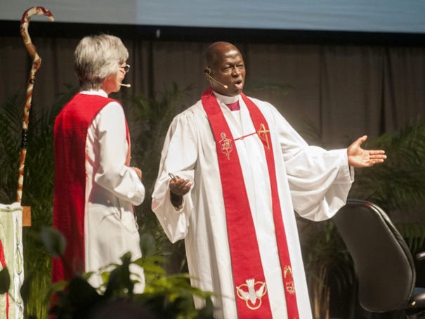 Bishop John K. Yambasu from Sierra Leone leads a worship service with Bishop Hope Morgan Ward during the N.C. United Methodist Church annual conference at the Wilmington Convention Center on Wednesday, June 10, 2015.
