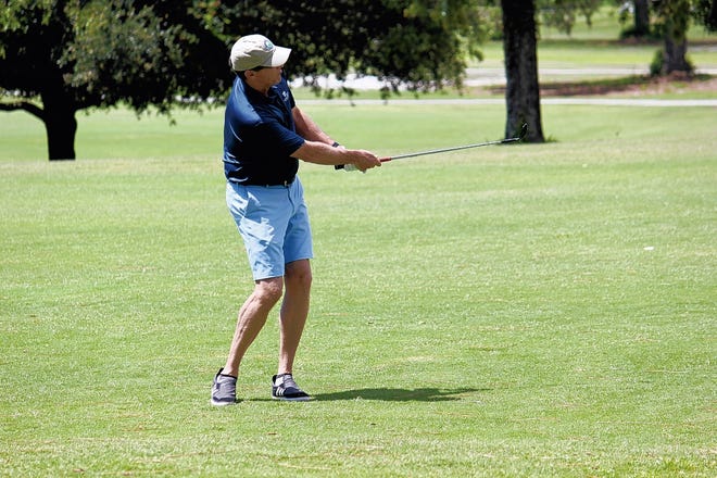 Walker Taylor hits off the fairway at the 2nd hole during the final round of the Wilmington Senior Amateur golf tournament at the Wilmington Municipal Golf Course on Sunday, June 7, 2015. Staff Photo By Ellen Kanzinger/StarNews Media