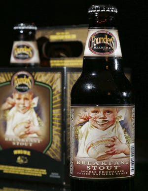 Bottles of Founders Brewing Breakfast Stout are displayed in North Andover, Mass. on Jan. 15. New Hampshire Gov. Maggie Hassan on June 2, 2015, vetoed a measure that would have allowed some images of minors to grace alcoholic beverage labels in the state as long as they didn't encourage young people to drink. AP Photo/Elise Amendola, File