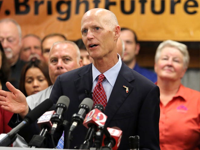 Rick Scott signed a bill Thursday that removes the adoption ban enacted in the days when entertainer Anita Bryant crusaded against gays.