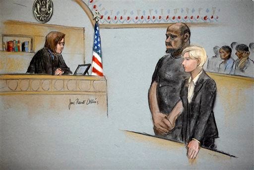 In this courtroom sketch, David Wright, second from left, is depicted standing with his attorney Jessica Hedges, right, as Magistrate Judge M. Page Kelley presides, left, during a hearing Wednesday, June 3, 2015, in federal court in Boston. Wright was ordered held Wednesday on a charge of conspiracy with intent to obstruct a federal investigation in the case of Usaama Rahim, who while under surveillance by terrorism investigators, was killed after he lunged with a knife at a Boston police officer and an FBI agent. (Jane Flavell Collins via AP)
