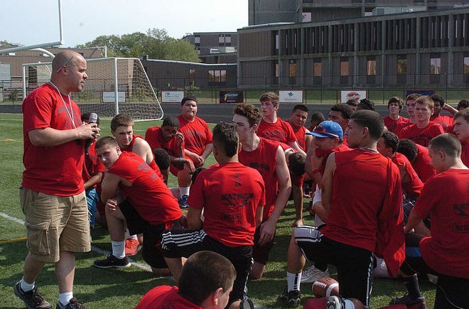 Coach Cris Borges talks to players at the Fall River Football Challenge at Durfee High School on Friday.