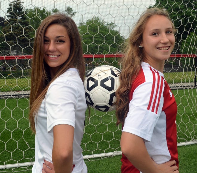 Zeeland East's Kenzie Fox, left, and Holland's Sadie Misiewicz are The Holland Sentinel Co-Girls Soccer Players of the Year. Dan D'Addona/Sentinel staff