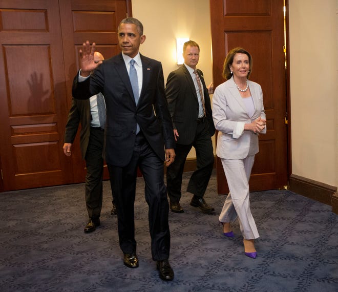 President Barack Obama and House Minority Leader Nancy Pelosi of Calif. leave meeting with House Democrats on Capitol Hill in Washington, Friday, June 12, 2015. The president made an 11th-hour appeal to dubious Democrats on Friday in a tense run-up to a House showdown on legislation to strengthen his hand in global trade talks.