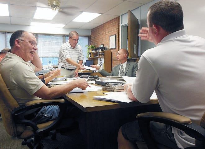 Shown during last Monday’s Mohawk village board meeting are, from left, Trustee Carmen Tubia, Superintendent of Public Works Michael Shedd, standing, Village Attorney Karl Manne and Mayor James Baron. Also present, but not shown here, were Trustees Kathleen Eisenhut, George Cryer and Matthew Watkins. TELEGRAM PHOTO/DONNA THOMPSON