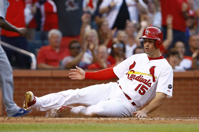 AP Photo/Billy Hurst St. Louis Cardinals' Randal Grichuk slides safely into home on a triple by Jon Jay during the second inning of a baseball game against the Kansas City Royals, Friday, June 12, 2015, in St. Louis.