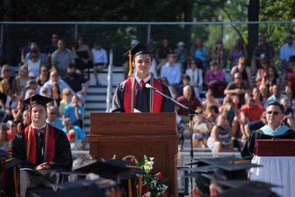 South Point High valedictorian Kendrik Icenhour speaks during the school's graduation ceremony Saturday.