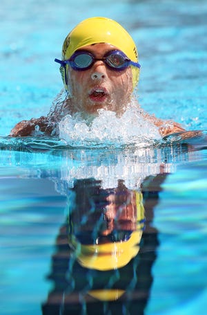 Mason Demetro swims in the Boys 10-and-Under 100 breaststroke event during Shelby Aquatic Center’s 2015 Summer Open at the Shelby City Park on Saturday. (Brittany Randolph / The Star)