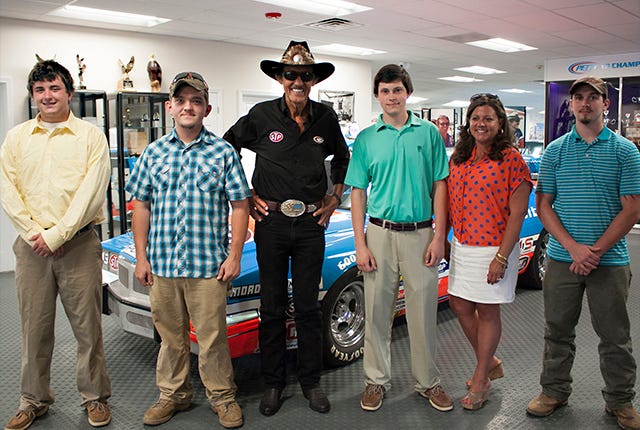 HONORED — Recipients of the Lynda Petty Scholarship to attend Randolph Community College pose with Richard Petty and daughter Rebecca Petty Moffitt. From left are Cameron Maddox, Trinity; Derrick Kidd, Eastern Randolph; Petty; Dylan Brooks, Wheatmore; Moffitt, and Troy Miller, Providence Grove. Jeremiah Echerd of Randleman is absent. (RCC photo)