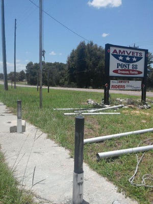 About 7 a.m. on Sunday an employee of the AMVETS Post 88 arrived at work to find that two 30-foot poles had been cut down.