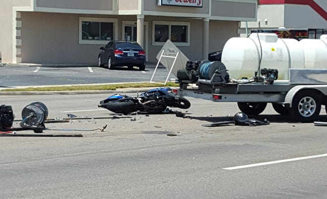 A motorcyclist was taken to a hospital in life-threatening condition following this crash Tuesday on Atlantic Boulevard.
