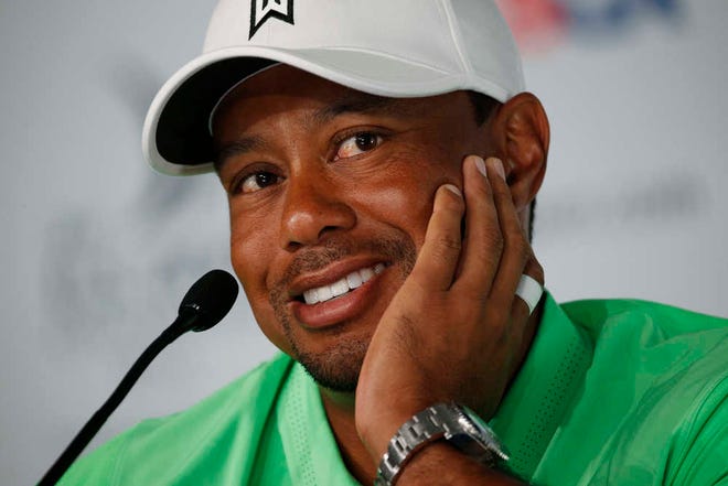Tiger Woods talks speaks to the media during a news conference for the U.S. Open on Tuesday at Chambers Bay in University Place, Wash. (AP Photo/John Locher)