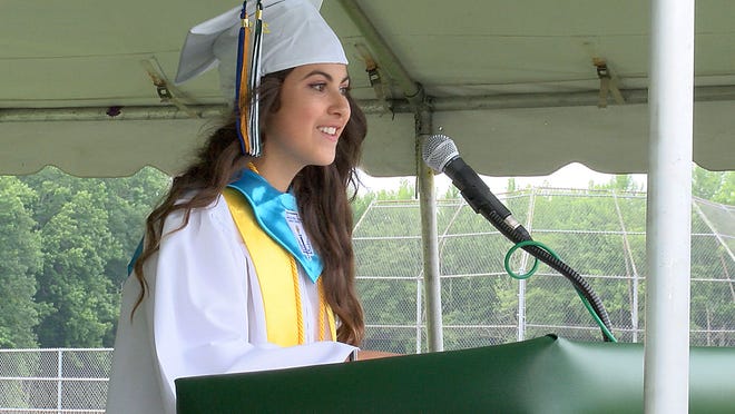 Natalie Rivera, senior class president, gives the welcome address at Pemberton High School graduation on Thursday, June 18, 2015.
