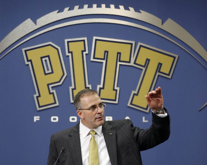 Pat Narduzzi, the longtime Michigan State defensive coordinator, gestures as he speaks at an NCAA college news conference in Pittsburgh where he was introduced as the new head football coach for Pittsburgh, on Dec. 26, 2014. So far Narduzzi's recruiting class is small, but experts say it's not a cause for concern.