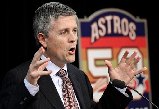 FILE - In this Dec. 8, 2011, file photo, Houston Astros general manager Jeff Luhnow answers a question during a baseball news conference in Houston. The Cardinals have become a model of success by mixing traditional scouting with a heavy dose of analytics, an approach that grew as Jeff Luhnow rose to power in the front office a decade ago. Luhnow took that skill to the Astros, whose player database was allegedly hacked by his former colleagues in St. Louis. (AP Photo/David J. Phillip, File)