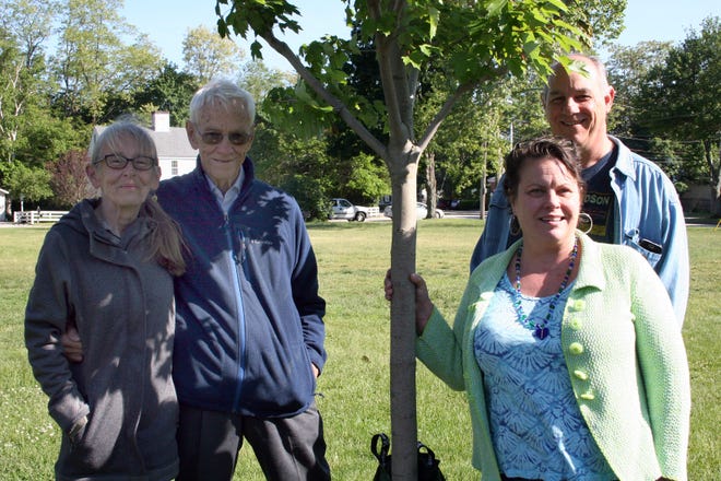 Members of the Scully family pose for a photo with the tree dedicated in the name of Dan Scully: David Scully, son, age 82; Scully Realy, granddaughter Janice; granddaughter Carrie Berry, granddaughter Janice; and Tom Scully, grandson. Courtesy photo/Eileen Flockhart
