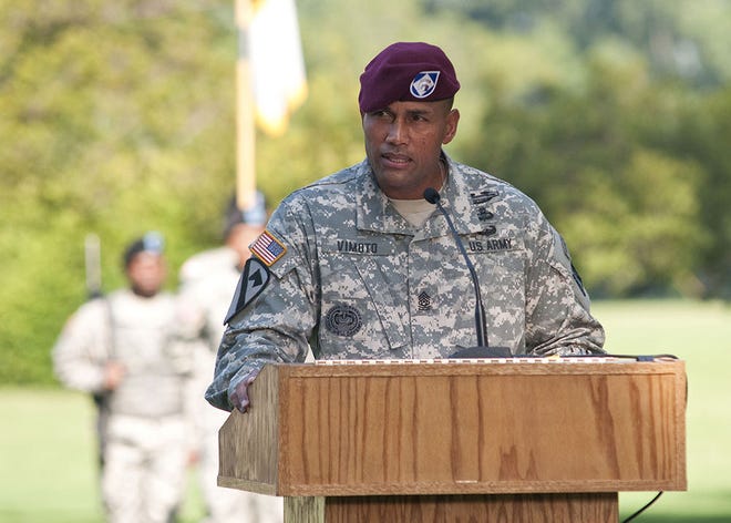 Command Sgt. Major Isaia T. Vimoto, speaks to audience members after he assumed responsibility of the XVIII Airborne Corps on the main post parade field, July 27. “This is our installation and each of you have a key role in it’s upkeep. Just as you are proud to be a paratrooper, you should also be proud of your community and do all you can to make it a better place and a safer place for our Soldiers and our Families to live,” said Vimoto. “I’m grateful for this opportunity to serve you, together we will take the center of the universe to greater heights. I look forward to our rendezvous with destiny and a difference we will make each day as we serve the people of this great installation.” photo by sharilyn wells/paraglide