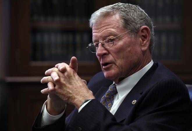 In this photo taken Jan. 7, 2015, Senate Environment Committee Chairman Sen. James Inhofe, R-Okla. speaks to reporters on Capitol Hill in Washington. Congressional Republicans are shrugging off Pope FrancisÃ¢â‚¬ call for urgent action on climate change and dismissing his attempt to frame global warming as a moral issue. Inhofe, CongressÃ¢â‚¬ leading global warming skeptic, said he disagreed with Ã¢â‚¬Å“the popeÃ¢â‚¬s philosophy on global warming.Ã¢â‚¬Â He also warned that the popeÃ¢â‚¬s encyclical will be used by "alarmists" to push policies that will lead to a tax increase that would hit the poor hardest. (AP Photo/Susan Walsh)