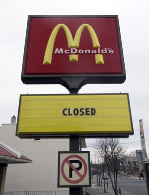 AP Photo/Mike Groll, File FILE - In this April 8, 2015, file photo, a seasonal McDonald's is closed for the winter in Lake George, N.Y. For the first time in more than 40 years, and perhaps ever, the number of McDonalds restaurants in the U.S. is shrinking.