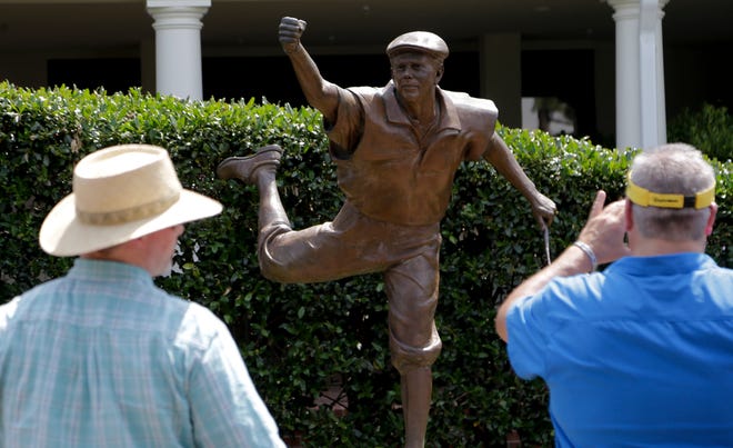 The statue at Pinehurst's famed No. 2 course commemorating Payne Stewart's dramatic U.S. Open victory is a popular stop for folks visiting the Sandhills of N.C. (Associated Press)