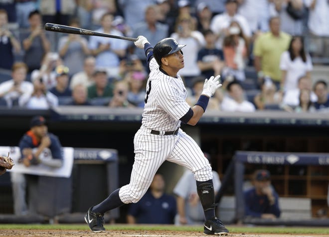 New York Yankees' Alex Rodriguez hits a home run for his 3,000th career hit, during the first inning of a baseball game against the Detroit Tigers Friday, June 19, 2015, in New York. (AP Photo/Frank Franklin II)