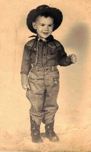 Patrick Dearen found an old photo of himself dressed as a cowboy some time while a child in the 1950s. Many of Dearen's novels focus on the Old West and the cowboys who made their living then. His novel "The Big Drift" has been awarded the 2015 Spur Award as Best Western Traditional Novel by the Western Writers of America. The WWA will hold its annual convention this week in Lubbock.