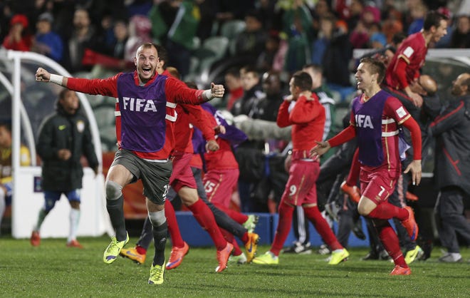 AP Photo/David Rowland Serbian players celebrate after defeating Brazil 2-1 in extra time to win the U20 soccer World Cup final in Auckland, New Zealand, Saturday, June 20, 2015.