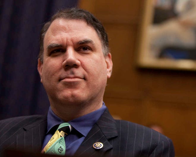 FILE - In this Oct. 1, 2009 file photo, Rep. Alan Grayson, D-Fla. listens during a hearing on Capitol Hill in Washington. For a while it looked like Florida Rep. Patrick Murphy might have a clear shot at earning the Democratic nomination for the U.S. Senate seat Republican Marco Rubio is surrendering to run for president. National and state party leaders quickly endorsed him, but fellow Rep. Alan Grayson, an outspoken liberal, seems determined to have a primary few in the party want to see. (AP Photo/Evan Vucci, File)