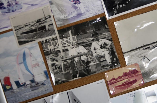 Photos of past events and members hang in the clubhouse of the Eugene Yacht Club at Fern Ridge Lake. A group who loved to boat together launched the club in 1940. (Andy Nelson/The Register-Guard)