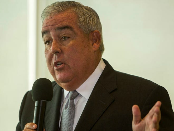 John Morgan speaks to the crowd at a USF medical marijuana rally Tuesday, Oct. 7, 2014, in the student center as part of the United for Care Medical Marijuana October Bus Tour. (AP Photo archive/Tampa Bay Times/Cherie Diez)