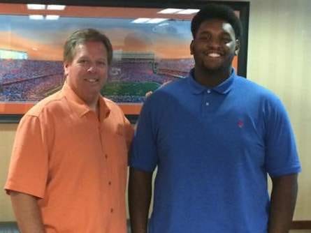 T.J. McCoy, right, is shown with University of Florida football coach Jim McElwain in this photo from McCoy's Facebook page.