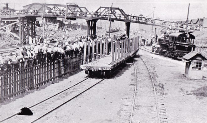 Ellwood City's original Second Street overpass was wooden and was reported to have carried dangerous traffic that claimed "a score of lives." This image is believed to be from the first decade of the 1900s. In 1931, a steel bridge replaced the wooden bridge.