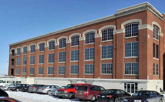 The western side of the Erie Maritime Museum, which is attached to Blasco Library, to the east, was photographed Feb. 12. The third floor of this side of the building was formerly occupied by the Center for Advanced Manufacturing & Technology, or CAMtech, and is currently owned by Erie County. The county currently uses the 6,400-square-foot space on the third floor for storage and hopes to use a land swap to secure parking for the building, so it can lease or use the space for county offices. Scott Enterprises, the private developer, owns the parking spaces pictured here but agreed on June 12, 2015 to a property swap with Erie Events and Erie County government to provide parking spaces to the south as part of the land swap. The deal also enables the developer to move forward with its proposed $150 million Harbor Place development project. ANDY COLWELL/
