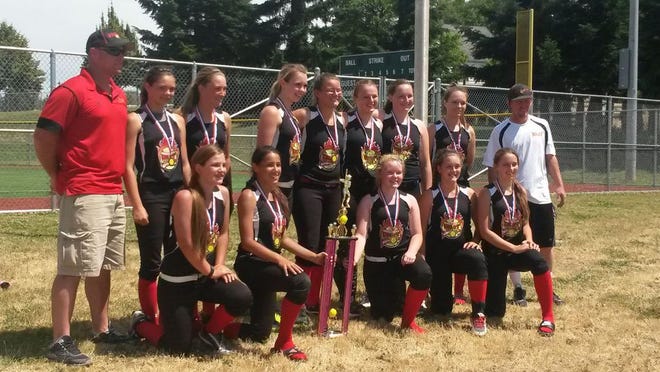 The Siskiyou Heat U14 softball squad, above, took first at a tournament in Oregon on Sunday. Submitted photo