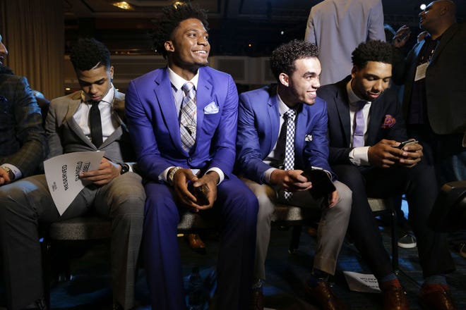 NBA Draft prospects (from left) D'Angelo Russell, Justise Winslow, Tyus Jones and Jahlil Okafor wait for the start of the draft lottery May 19 in New York.