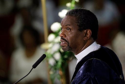 FILE - In this June 21, 2015, file photo, Rev. Norvel Goff speaks during a prayer service at the Emanuel A.M.E. Church in Charleston, S.C., four days after a mass shooting that claimed the lives of it's pastor and eight others. The 65-year-old Goff was named interim leader of the historic church called "œMother Emanuel" at one of the lowest points in its nearly 200-year history. But the Georgetown, South Carolina, native says the church won"™t dwell on the past. (AP Photo/David Goldman, Pool, File)