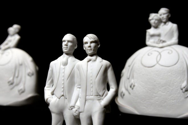 Wedding cake toppers for same-sex couples by Kish & Co. Married couples can take advantage of several estate-planning moves.