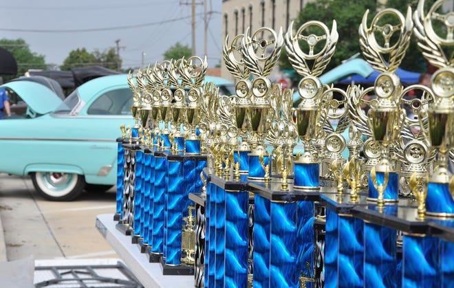Many trophies in several different categories wait to be awarded to lucky winners at the end of judging Saturday at the Rustic Auto Car Show.