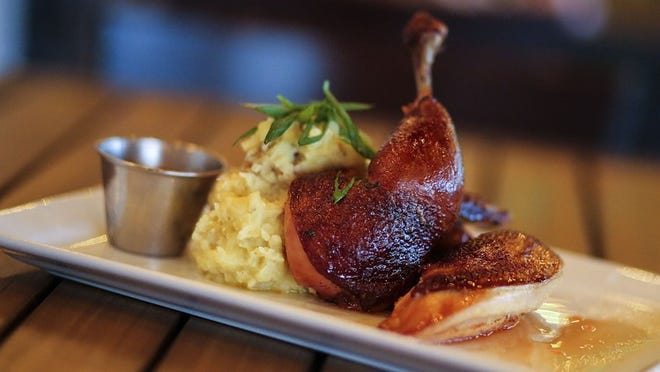 Smoked chicken is on the menu at SoHo’s ‘Pignic.’ (Photos by Damon Higgins/ The Palm Beach Post)