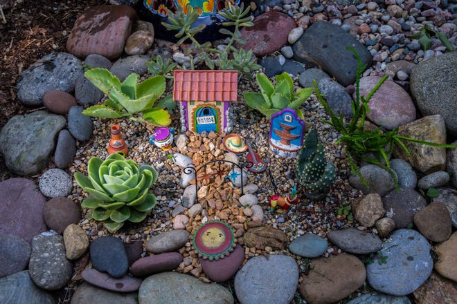 Gardener Nancy Eleder incorporates rocks and succulents in this fairy garden she named “Mi Casa, Su Casa.”