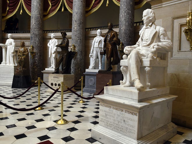 A statue of Alexander Hamilton Stephens is on display in Statuary Hall on Capitol Hill in Washington, Wednesday, June 24, 2015. The statue was given to the National Statuary Hall Collection by Georgia in 1927. Stephens was a dedicated statesman, an effective leader and a powerful orator but he renewed debate about symbols of the Confederacy in the wake of the horrific shooting at a black church in Charleston, South Carolina, raises new questions about whether he will. The move in South Carolina to remove the Confederate flag from the statehouse grounds is prompting members of Congress to take a new look at Confederate images that surround them every day, including statues of Stephens, Confederate Gen. Robert E. Lee, Confederate President Jefferson Davis and a number of other Confederate leaders or fighters.