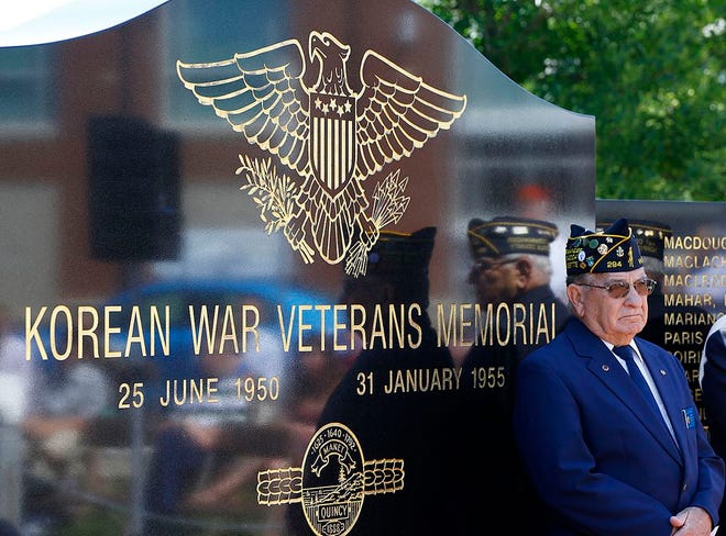 West Quincy resident Bill Corcoran, past commander of the American Legion’s Morrisette post, stands in front of Quincy’s Korean War memorial on Thursday, June 25, 2015. Corcoran served in Korea as a member of the Navy.
