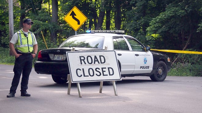 Newmarket police closed Grant Road between the intersection with Ash Swamp Road and Neal Mill Road Thursday afternoon. Police asked that motorists use alternate routes to avoid that area while a fatal hit-and-run accident was investigated. Photo by Max Sullivan/seacoastonline