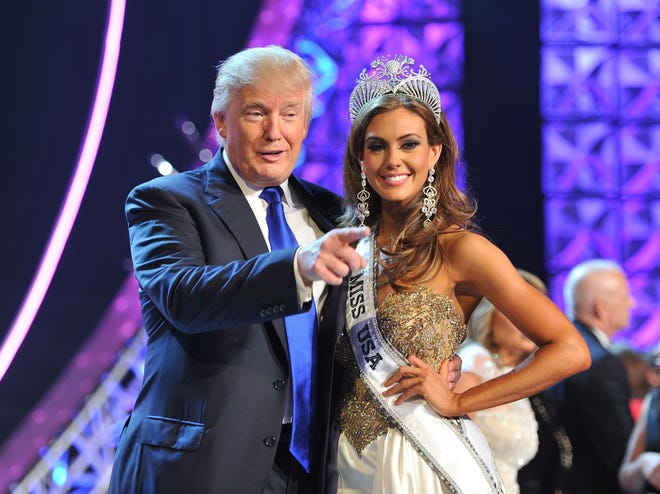Donald Trump and Miss Connecticut USA Erin Brady onstage after Brady won the 2013 Miss USA pageant in Las Vegas, Nevada. The Associated Press