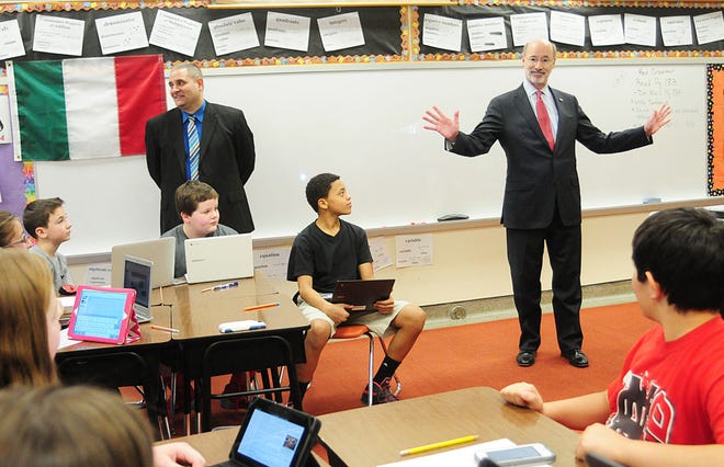 Gov. Tom Wolf speaks with a sixth-grade class March 18 at George Washington Intermediate School in New Castle. He was there as part of an effort to promote his proposed budget, which includes increased education funding. A recent poll by Franklin & Marshall College found that a majority of Democrats (69 percent), Republicans (52 percent) and independents (51 percent) said they support increasing state income taxes if it helps reduce property taxes.