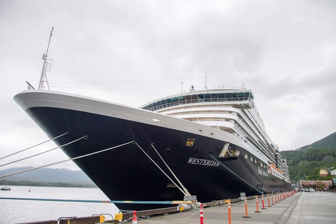 The Holland America Line cruise ship Westerdam sits in dock in Ketchikan, Alaska, on Thursday, June 25, 2015. Officials say eight passengers on an excursion off the ship and a pilot were in a plane that was found crashed against the granite rock face of a cliff about 20 miles northeast of Ketchikan, Alaska. All nine people aboard died in the crash, authorities said. (Taylor Balkom/Ketchikan Daily News via AP).