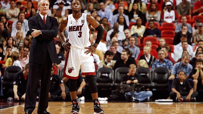 Pat Riley has been with the Miami Heat for 11 of Dwyane Wade’s 12 seasons as a pro. (Photo by Doug Benc/Getty Images)