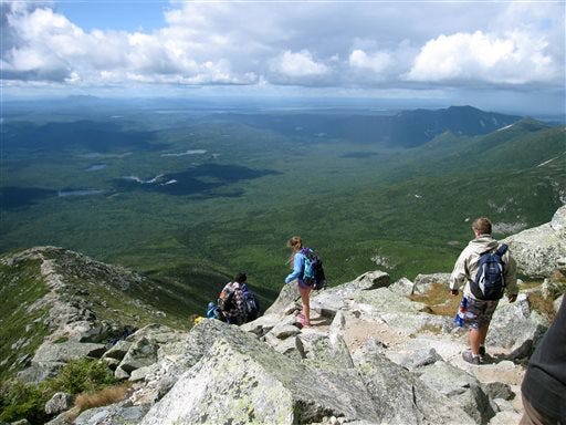 Hikers make their way down Mount Katahdin in Baxter State Park in Maine. Its peak is the northern terminus of the Appalachian Trail. AP Photo