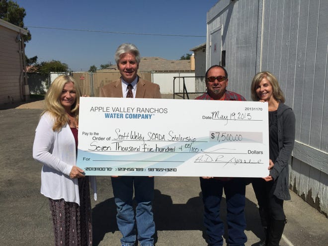 Left to Right: Terri Brown, SCADA Coordinator, Granite Hills High School, Tony Penna, Vice President and General Manager, Apple Valley Ranchos Water Co., Derick and Jill Sandwick, Owners, High Desert Underground. Photo courtesy of Apple Valley Ranchos Water Company